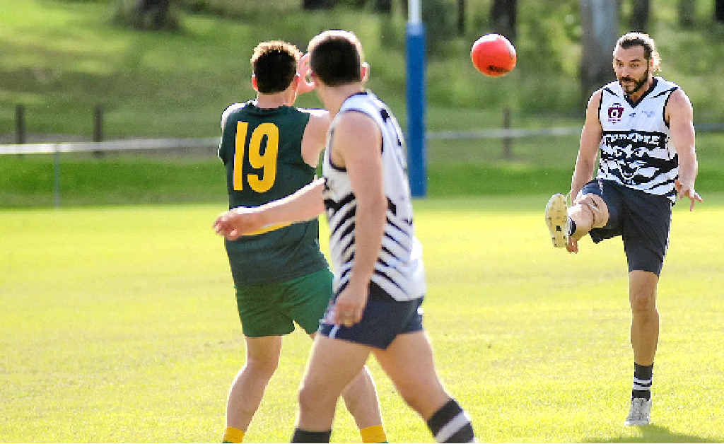 KICK: Gympie Cats player Adam Hendry scored three goals for his team gainst the Maroochydore Roos at the weekend. KICK: Gympie Cats player Adam Hendry scored three goals for his team gainst the Maroochydore Roos at the weekend.
